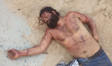 दरभंगा के कबराघाट में सड़क किनारे मिला अज्ञात युवक का शव, शरीर में चोट के कई निशान